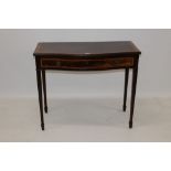 19th century mahogany and satinwood crossbanded serpentine side table with single drawer on square