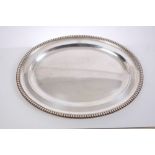 Fine quality Victorian silver meat dish of oval form, with large bead border and engraved crest,