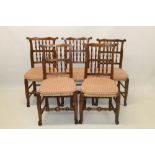 Set of eight beech and elm spindle back dining chairs,