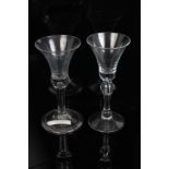 Mid-18th century drinking glass with bell-shaped bowl and teardrop stem on folded foot and another