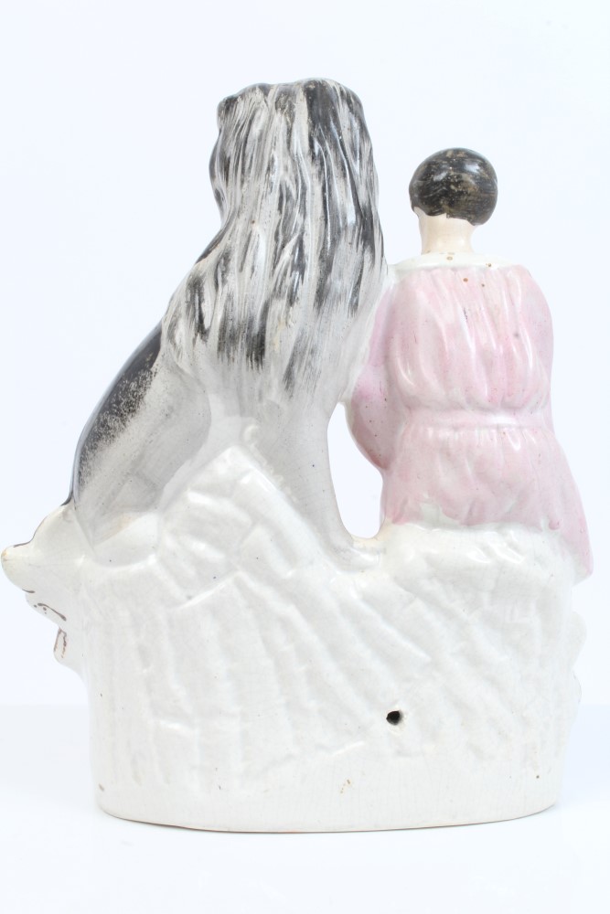 Victorian Staffordshire figure of Daniel holding the paw of a lion, on rocky base, - Image 2 of 3