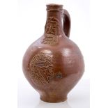 17th century Rhenish stoneware Bellarmine bottle with brown mottled glaze, string neck,