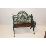 19th century cast iron bench with ornate gothic tracery,