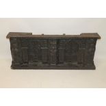 17th century and later carved oak overmantel with two recessed arched foliate panels between