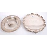 George V silver salver of hexagonal form, with piecrust border and engraved dedication,