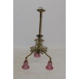 Victorian-style ornate brass ceiling light with central knopped column issuing three scrolling leaf