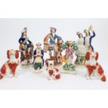 Collection of Victorian Staffordshire figures - including Turk, pair spaniels,