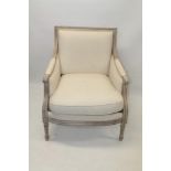 Limed beech and upholstered easy chair,