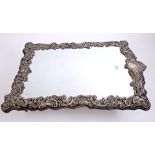 Early Edwardian silver mounted dressing table mirror with rococo pierced scroll and foliate