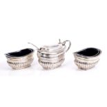 Late Victorian silver condiment set - comprising pair salts of half fluted form,