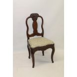 18th century Italian walnut side chair, the shaped back with carved shell cresting and solid splat,