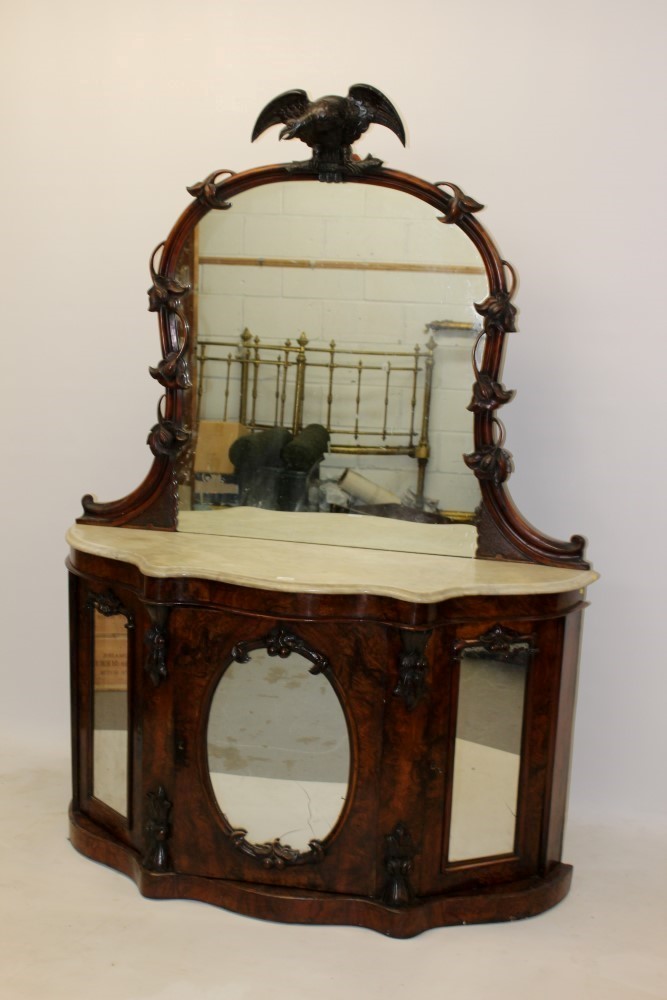 Victorian burr walnut marble topped chiffonier, the arched mirrored back with carved eagle surmount,