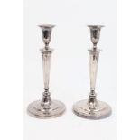 Pair Victorian silver plated candlesticks of tapering form, with fluted decoration,