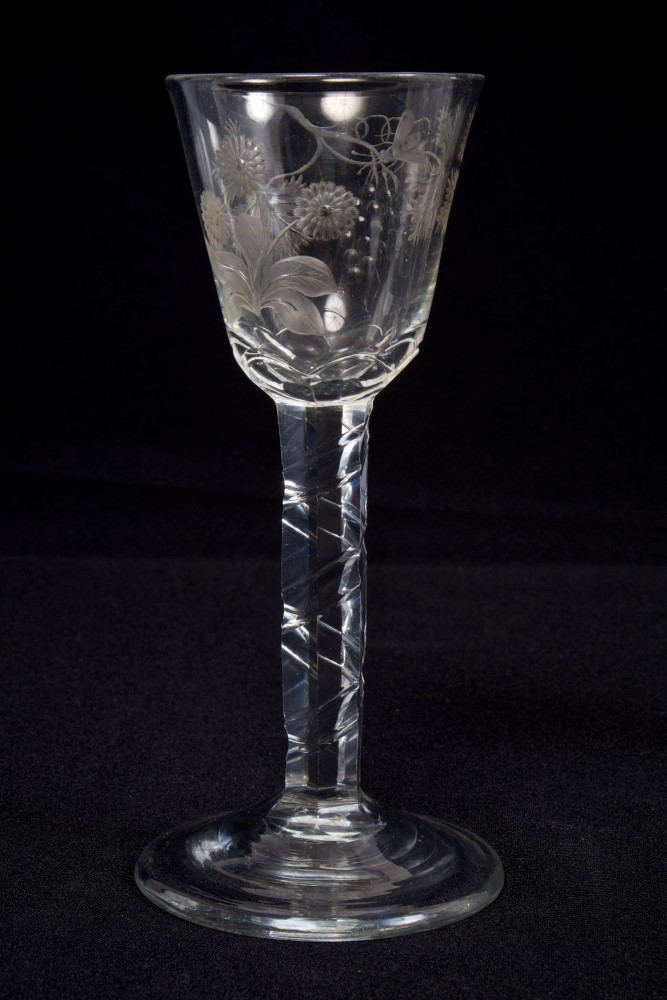 Georgian wine glass, circa 1765, with finely engraved bowl with fruiting vines, flowers and insects,
