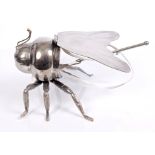 Early 20th century silver plated novelty honey pot in the form of a bee with clear glass body