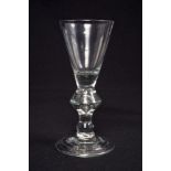 Georgian wine glass, circa 1720, with funnel bowl, angular knop with air-bubble, on splayed foot,