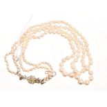 Cultured pearl necklace with a double strand of graduated cultured pearls measuring 6.75mm - 2.