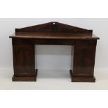 Early Victorian mahogany pedestal sideboard with arched gallery back above frieze drawer and raised