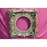 Early 19th century ornate gilt and gesso frame for a circular oil,