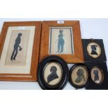Collection of six 19th century silhouette portrait miniatures - including paper cut portrait on
