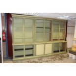 Massive green painted glazed bookcase,