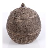 Eastern white metal pot of globular form, with allover applied filigree decoration,