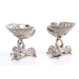 Pair good quality silver plated shell salts on dolphin supports and triangular bases, 8.