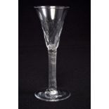 Georgian wine glass, circa 1760, with funnel bowl with moulded flutes,