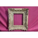 Late 18th century carved giltwood frame, internal measurements 21.