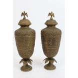Pair early 20th century Indian engraved brass urns and covers with eagle mounts and engraved