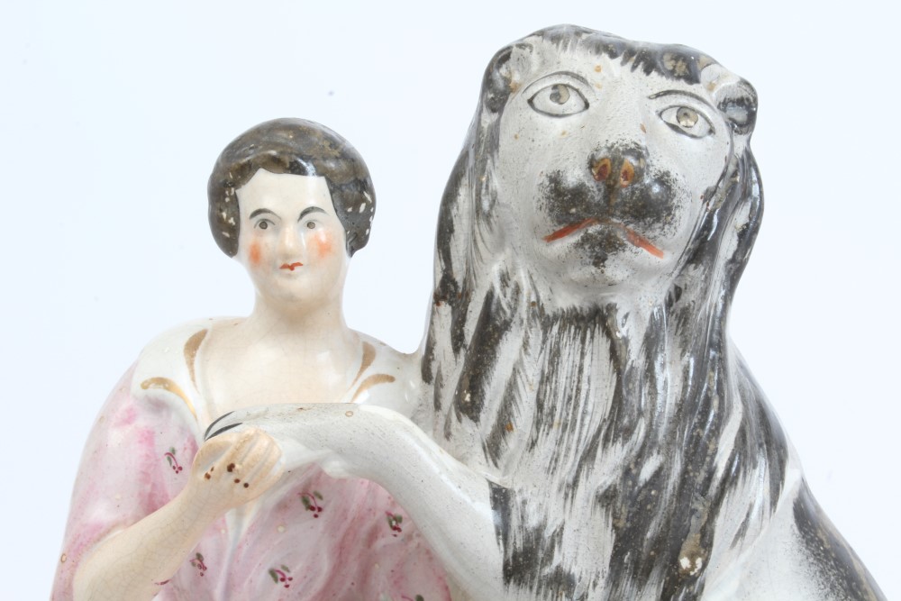 Victorian Staffordshire figure of Daniel holding the paw of a lion, on rocky base, - Image 3 of 3