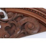 Finely carved 19th century oak demi-lune pediment with central vacant cartouche within flowering