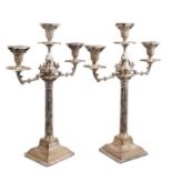 Pair Victorian silver plated three-light candelabra with Corinthian columns entwined with vines,