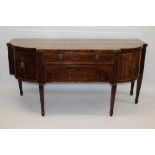 Substantial George III mahogany tulipwood crossbanded and line-inlaid bowed breakfront sideboard