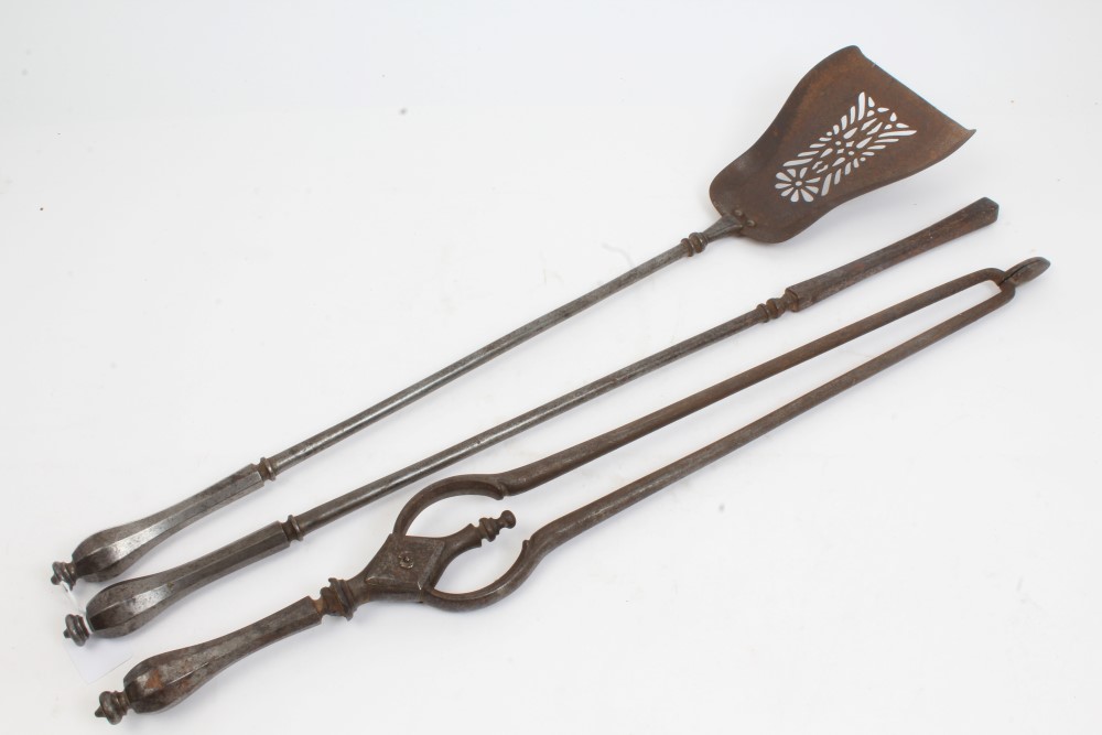 Set of three Georgian steel fire implements with faceted handles