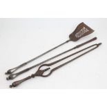 Set of three Georgian steel fire implements with faceted handles
