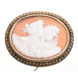 19th century Italian carved shell cameo brooch, the oval cameo depicting classical females,