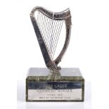 Contemporary silver horse racing trophy in the form of a harp,