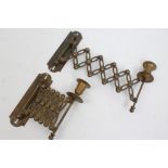 Pair Victorian-style wall mounted brass candle sconces with concertina-action brackets