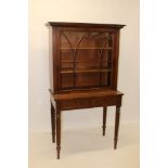 Early Victorian mahogany cabinet on stand,