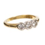 Diamond three stone ring with three round brilliant cut diamonds estimated to weigh approximately 0.