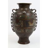 Late 19th century Chinese cloisonné vase of archaic baluster form,