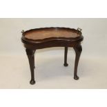 Edwardian mahogany and marquetry inlaid kidney-shaped tray with undulating gallery and twin brass