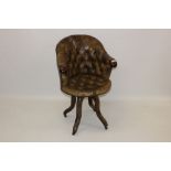 Good quality late 19th / early 20th century button leather upholstered desk chair with tub-shaped