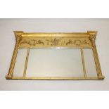 Regency gilt gesso triple plate overmantel mirror with relief trophy frieze and three rectangular