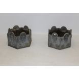 Pair of good quality old lead garden planters of hexagonal form with cast urn and floral rosette