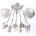 19th century Continental white metal chatelaine with cast and pierced belt mount and six implements