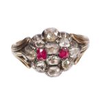 Early 19th century ruby and diamond cluster ring with two mixed cut rubies surrounded by nine rose