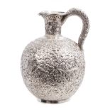 Late 19th century Indian silver jug of globular form, narrow neck and silver handle,