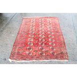 Good antique Tekke Turkoman rug with three rows of eleven quartered medallions in borders,